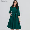 Image of 2019 Summer Vintage Soild Lantern Sleeve A-Line Dress Women Elegant O-Neck Half Sleeve Pocket Sashes Knee-Length Casual Dress